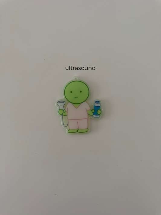 green guy glow in the dark badge reels x