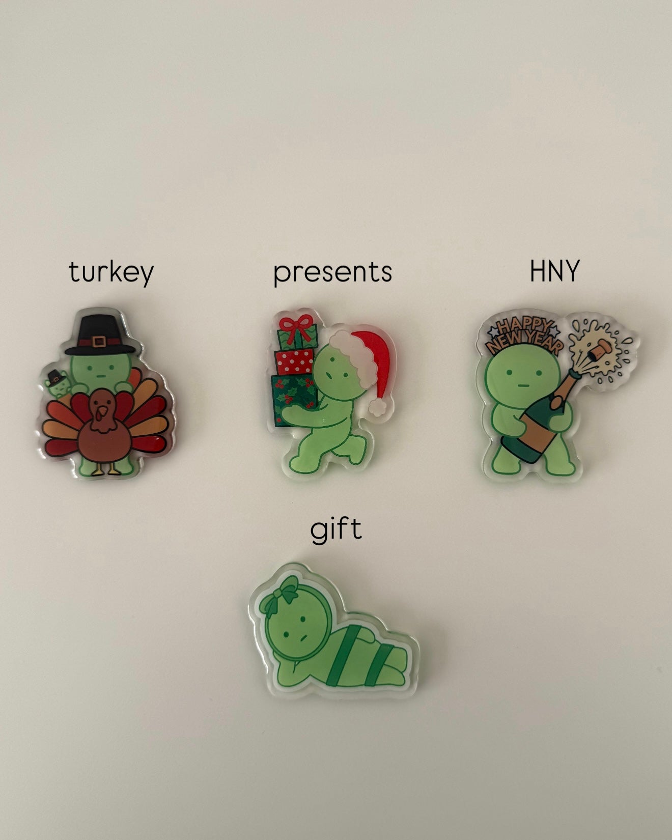 green guy holiday badge reels