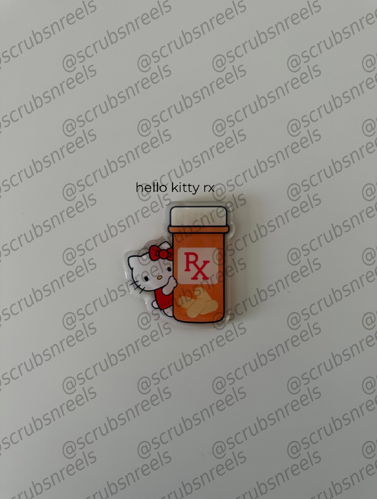 kitty badge reel