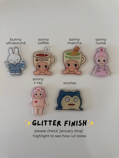 glitter bunny/sonny/snoopy badge reels